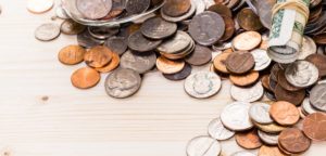 money falling out of jars