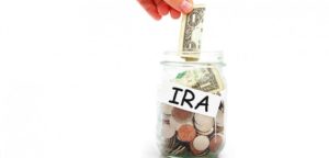 money in jar labeled i r a