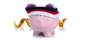 piggy bank with tape measure and sweatband